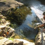 Jeff Shaw testing the water before taking a morning dip in the spring